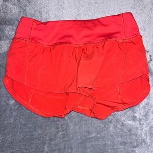 Bright red lululemon hotty hot shorts size 2